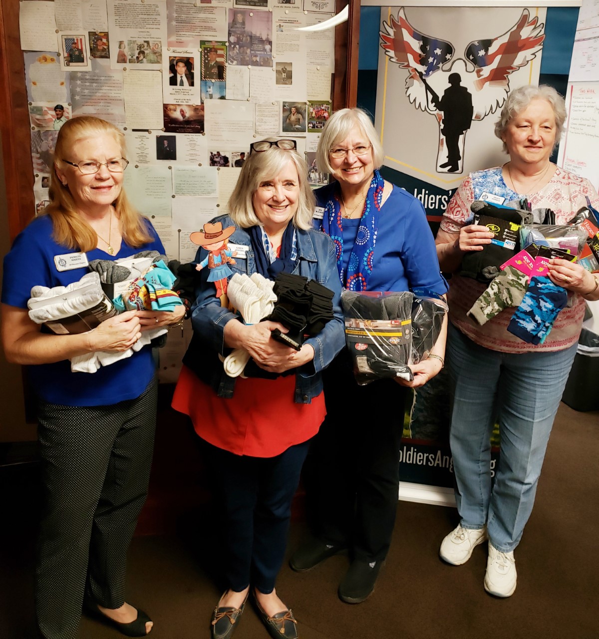 presenting socks to Soldiers' Angels